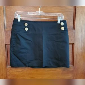 Express mini skirt with gold buttons